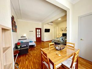 TV a/nebo společenská místnost v ubytování Rooms Aribau