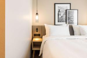 Radisson Hotel Leipzig客房内的一张或多张床位