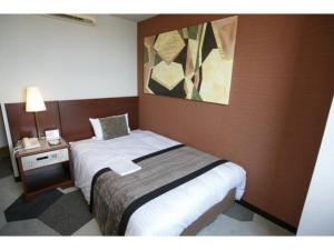 Giường trong phòng chung tại Recent Culture Hotel - Vacation STAY 29807v