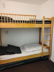 Un pat sau paturi într-o cameră la Résidence Varet 2 - Studio cabine 5 personnes Varet MAE-6064