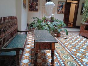 Uma área de estar em Hotel España Lima Peru