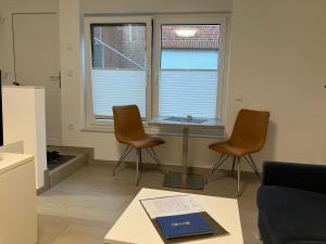 Ein Sitzbereich in der Unterkunft Haus Etzold