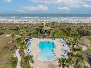 an overhead view of a swimming pool at the beach at Beachfront resort Heated Pool 3King beds 85in TV BBQ in Saint Augustine Beach