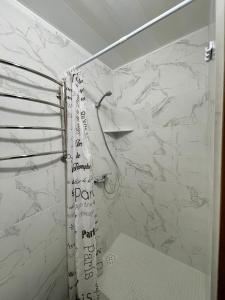 Koupelna v ubytování Затишні номери в самому центрі Одеси