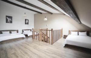 Postel nebo postele na pokoji v ubytování Aparthotel Na Mytniy