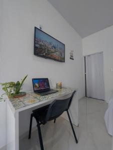 TV a/nebo společenská místnost v ubytování Casa Grécia Jericoacoara