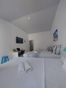 Postel nebo postele na pokoji v ubytování Casa Grécia Jericoacoara
