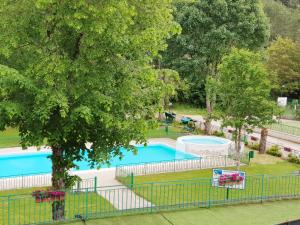 an image of a swimming pool at a park at Hotel Bamby in Pescasseroli