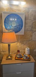 Příslušenství pro přípravu čaje a kávy v ubytování Servants' Quarters Studio Apartment + 6 fotografií