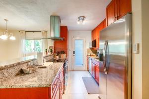 a kitchen with a stainless steel refrigerator at Pet-Friendly Home - 3 Mi to University of Florida! in Gainesville