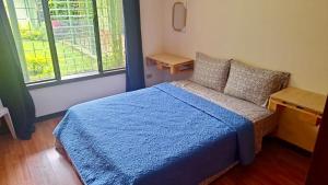 Ένα ή περισσότερα κρεβάτια σε δωμάτιο στο Carolina Hostel