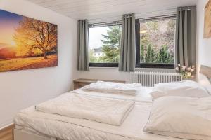 Postel nebo postele na pokoji v ubytování 50145 Whg