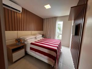 Katil atau katil-katil dalam bilik di GUARAJUBA Porto Smeralda Flat +18 gambar