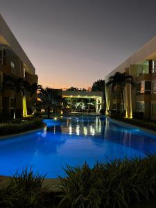 Kolam renang di atau dekat dengan GUARAJUBA Porto Smeralda Flat