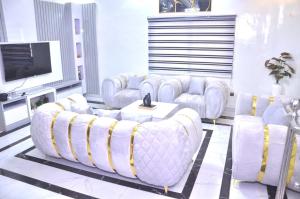 TV a/nebo společenská místnost v ubytování Shine Residence