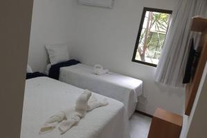 Voodi või voodid majutusasutuse Apartamento Iloa 07-H toas +50 fotot