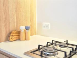 Kuchyň nebo kuchyňský kout v ubytování Modern 3 Bed apt near Lidcombe station