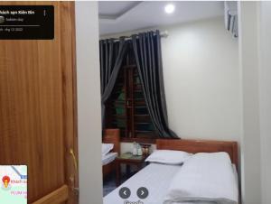 Postel nebo postele na pokoji v ubytování Kiên Bin Đồng Văn Hotel