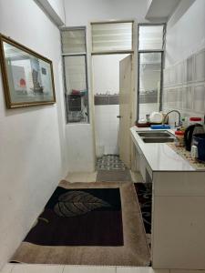 Kuchyň nebo kuchyňský kout v ubytování Residence Homestay wakaf Che Yeh + 28 fotografií