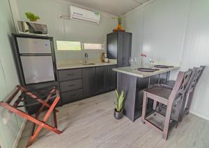 Kuchyň nebo kuchyňský kout v ubytování Dadirri Cozy House Santa Elena Monteverde