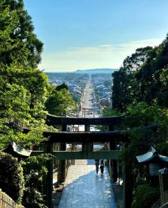 a view from the top of a mountain with a street at Hotel Plum in Dazaifu