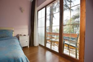 Postel nebo postele na pokoji v ubytování Nizam Butik Otel Büyükada + 37 fotografií