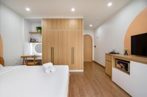 Postel nebo postele na pokoji v ubytování MOONLIT Suites Hotel by Luxe Paradise + 35 fotografií