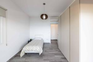 Postel nebo postele na pokoji v ubytování Pomos Seashore villa