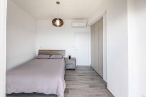Postel nebo postele na pokoji v ubytování Pomos Seashore villa