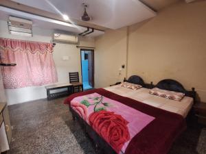 Voodi või voodid majutusasutuse Hotel Om Pushkar toas