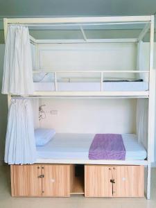 Postel nebo postele na pokoji v ubytování Amy 2 Hostel Hue