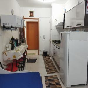 A cozinha ou cozinha compacta de Studio São Rafael