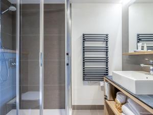 a bathroom with a shower and a sink at Appartement de standing 4 pièces, SPA, parking, Les Saisies - FR-1-810-10 in Les Saisies +7 photos