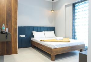 Postel nebo postele na pokoji v ubytování Hotel Five Star