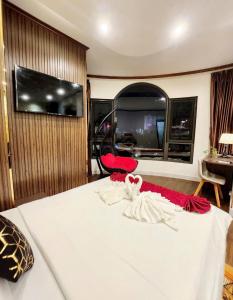 TV a/nebo společenská místnost v ubytování HA Hotel & Apartment