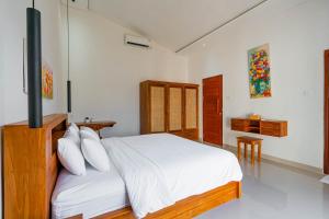 Un ou plusieurs lits dans un hébergement de l'établissement Theodosia Villa By Bali Cabin