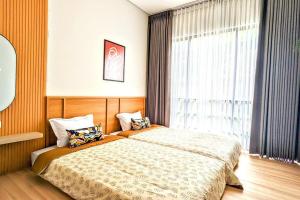 Billede fra billedgalleriet på Cottonwood Villa Pramestha Dago - BBQ Jacuzzi Netflix i Cikidang 1