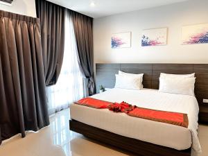 Postel nebo postele na pokoji v ubytování Crystal Suites Suvarnbhumi Airport