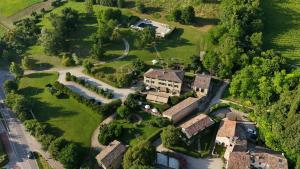 an aerial view of a house with a yard at Resort Locanda San Verolo Boutique Hotel in Costermano sul Garda