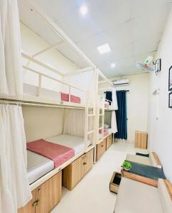 Postel nebo postele na pokoji v ubytování Amy 2 Hostel Hue
