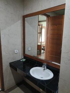 Koupelna v ubytování Hastina Hotel Lombok