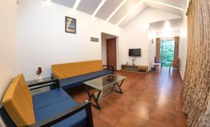 TV a/nebo společenská místnost v ubytování Lakkidi Mist Resort
