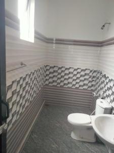 Koupelna v ubytování Thenu Homestay