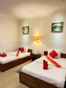 Letto o letti in una camera di Nice Guesthouse