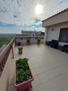 A balcony or terrace at NSM Casa di Fulmine attico con box privato