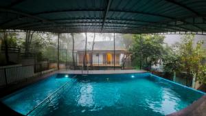 Bazén v ubytování Lakkidi Mist Resort nebo v jeho okolí