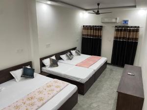 Letto o letti in una camera di Nakshatra palace