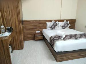 Postel nebo postele na pokoji v ubytování Hotel Bulande Comforts 1 Bhk Flat Manyata Tech Park