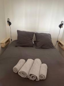 Ένα ή περισσότερα κρεβάτια σε δωμάτιο στο Appartement Cosy, vue Mer