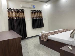 Letto o letti in una camera di Nakshatra palace